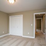 Guest bedroom and closet in Woodridge subdivision