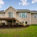 Back exterior and deck of new home in Woodridge subdivision in St. Johns, Michigan