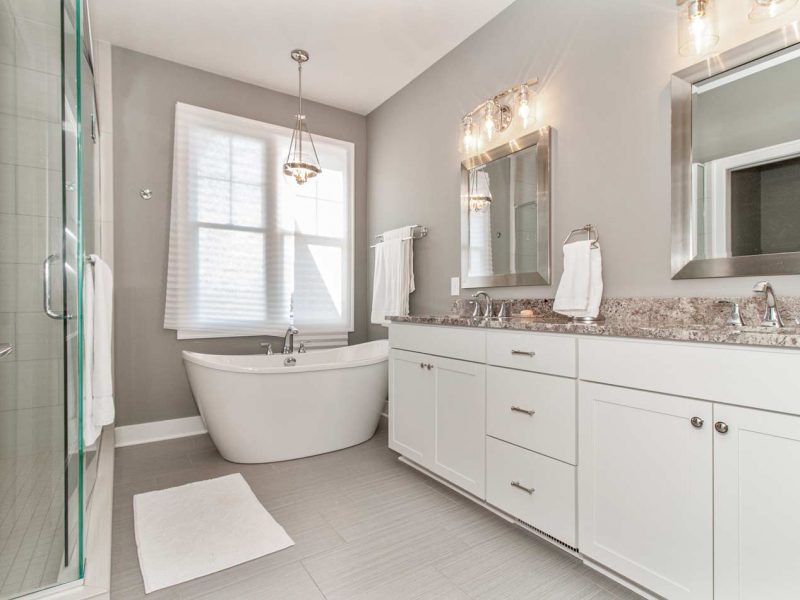 Master bath with ceramic shower and soaking tub